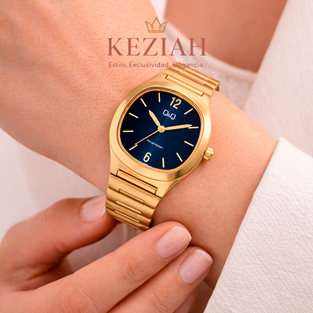 Reloj Original Q&Q Q02C-003PY para Mujer Elegancia clásica en dorado con esfera azul
